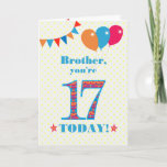 Tarjeta Para Brother 17th Birthday Bunting Balloons Card<br><div class="desc">Una tarjeta de cumpleaños colorida para un hermano de 17 años, El gran número 17 está lleno de un patrón naranja, rojo y azul, delineado en azul brillante. Hay globos y racimos en la parte superior, con colores que coinciden y el saludo de la portada es "¡Hermano, hoy tienes 17...</div>
