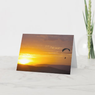 Tarjeta Parapente al atardecer