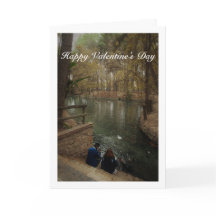 Pareja alimentando patos en el parque San Vicente