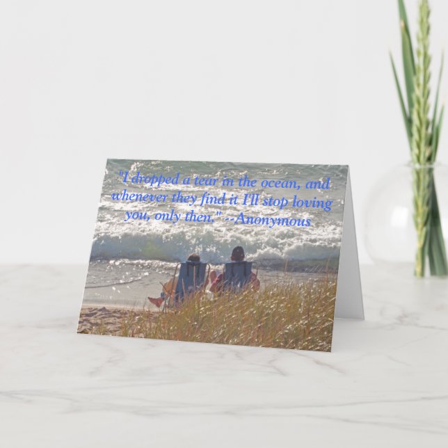 TARJETA "PAREJA SENTADA CONTENIDAMENTE EN LA PLAYA" ANIVER (Anverso)