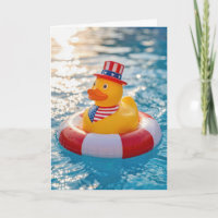 Pato de goma amarillo del 4 de julio en la piscina