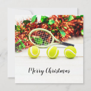 Tarjeta Pelota y raqueta de tenis con decoración navideña