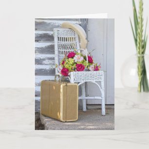 Tarjeta pensando en la maleta y las flores