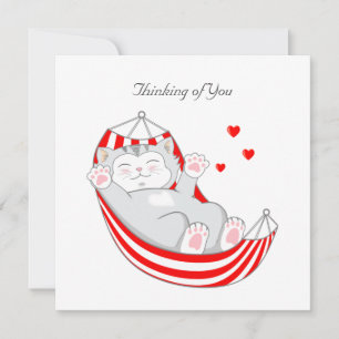 Tarjeta Pensando en ti gatito con corazones en hamaca
