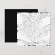 Elegante árbol de palmas deja un patrón blanco y n