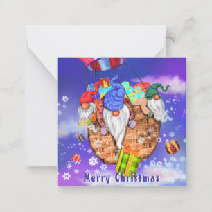 Tarjeta Pequeña Gnomos de Navidad volando un globo y dando regalos