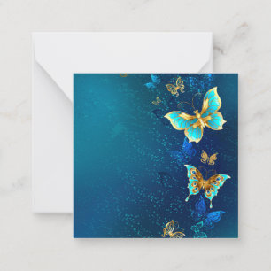 Tarjeta Pequeña Mariposas doradas sobre fondo azul