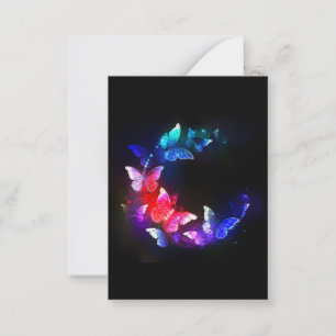 Tarjeta Pequeña Mariposas nocturnas de neón brillante sobre fondo 