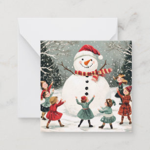 Tarjeta Pequeña Navidades de snowman en la escena de las maravilla