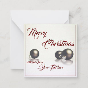 Tarjeta Pequeña Tres bolas de Navidad delante de un fondo claro
