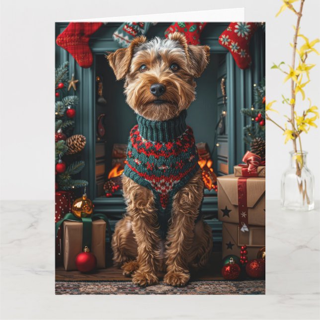 Tarjeta Perro Airedale con chimenea de regalos para Navida (flor amarilla)