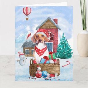 Tarjeta Perro Beagle en casa de Navidad con nieve
