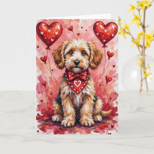Tarjeta Perro Briard Valentine sentado con corazones rojos