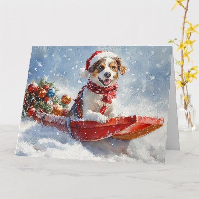 Tarjeta Perro Brittany Spaniel en Trineo de Navidad (flor amarilla)