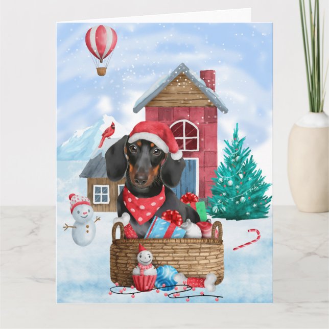 Tarjeta Perro Dachshund en la casa de Navidad con nieve (Anverso)