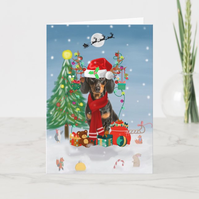 Tarjeta Perro Dachshund en la nieve con regalos de Navidad (Anverso)