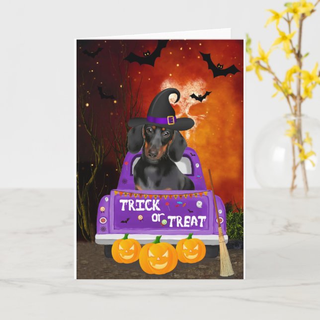 Tarjeta Perro Dachshund en un camión de Halloween (flor amarilla)