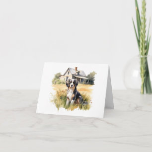 Tarjeta Perro de granja con vieja casa de granja en blanco