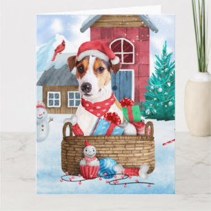 Tarjeta Perro Jack Russell en casa de Navidad con nieve