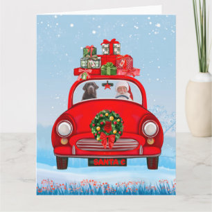 Tarjeta Perro Labrador en auto con Santa Claus