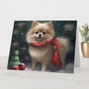 Tarjeta Perro panomerano en Navidades de nieve