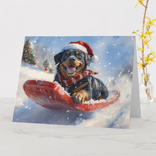 Tarjeta Perro Rottweiler con mangas y Navidades que nieva (flor amarilla)