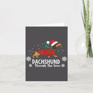 Tarjeta Perro salchicha de Navidad a través de la nieve Sa