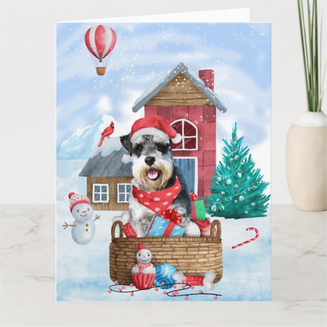 Tarjeta Perro Schnauzer en casa de Navidad con nieve (Anverso)