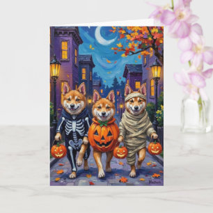 Tarjeta Perros Akita Trick-or-Treating con disfraces de Ha
