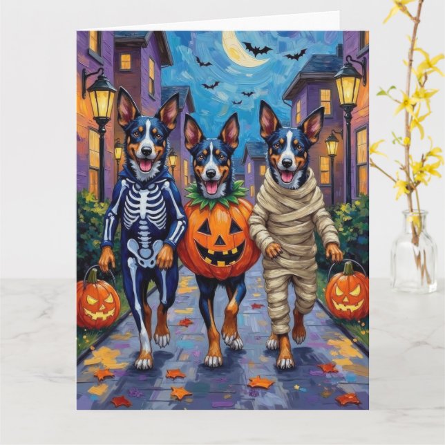 Tarjeta Perros Blue Heeler pidiendo dulces en Halloween (flor amarilla)