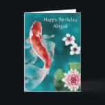 Tarjeta Pescado Koi personalizado, flores de cerezo cumple<br><div class="desc">Un bonito diseño japonés de tarjetas de cumpleaños con un Koi Fish nadando en un estanque con un lirio y flores flotantes de cerezo. Personalizar con un nombre en la parte delantera y un saludo de cumpleaños personalizado dentro. Si necesita ayuda con la personalización o elementos adicionales con un diseño...</div>