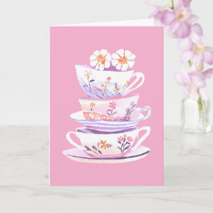 Tarjeta Pila de taza de té en bendiciones de flores y past