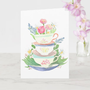Tarjeta Pila de tazas de té en pastel con flores