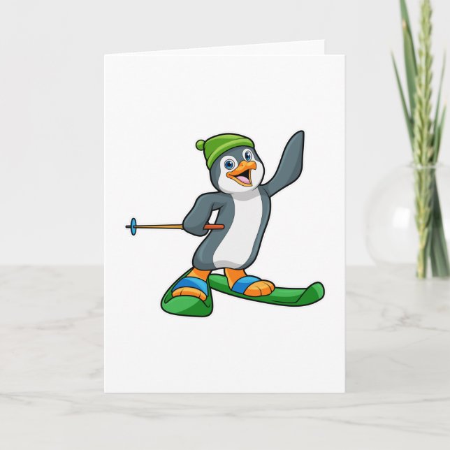 Tarjeta Pingüino como esquiador con pista de esquí y gorro (Anverso)