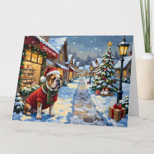 Tarjeta Pintura del pueblo navideño nevado con Bulldog