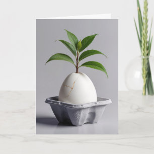 Tarjeta Planta verde que crece a partir de un huevo blanco