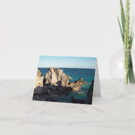 Tarjeta Playa de herradura sobre las rocas