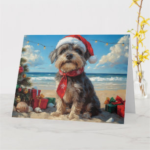 Tarjeta Playa de Navidades de perros de peluche Griffon