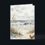 Tarjeta Playa Pensando en Ti con Papel Rizado<br><div class="desc">Una serena escena costera en acuarela presenta olas suaves lamiendo una orilla arenosa,  bordeada de hierbas altas,  mientras un barco de vela se desliza en el horizonte distante bajo un cielo nublado,  con una esquina rizada en el papel</div>
