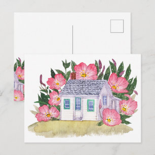 Tarjeta postal de cabaña costera y flor silvestre