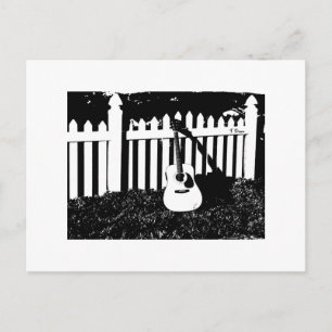 Tarjeta postal de guitarra acústica y valla