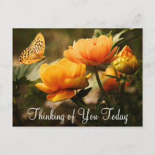 Tarjeta postal de mariposa y flores