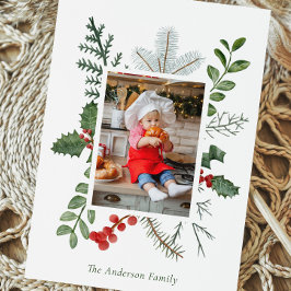 Tarjeta postal de Navidad con vegetación y bayas