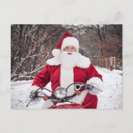 Tarjeta postal de Papá Noel montando una motocicle