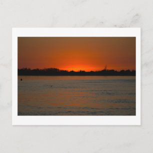 Tarjeta Postal de puesta de sol en el paisaje mari
