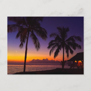 Tarjeta postal de puesta de sol en una isla de pla