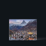 Tarjeta postal de viaje Zermatt Swiss Souvenir<br><div class="desc">Captura la magia de Zermatt con una postal de viaje de recuerdo desde el majestuoso Matterhorn hasta los encantadores chalés suizos, Zermatt capta la esencia de la belleza alpina. Comparte tus experiencias inolvidables con una impresionante postal de viaje de Zermatt, un recordatorio tangible de tu mágico viaje. Keepsake memorable: atesora...</div>
