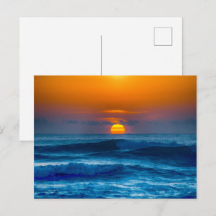 Tarjeta postal escénica de la puesta de sol del oc