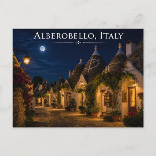 Tarjeta postal nocturna de Alberobello Italia