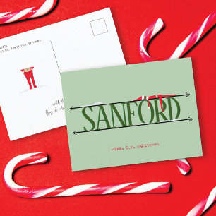 Tarjeta postal verde de Navidad con travesuras de